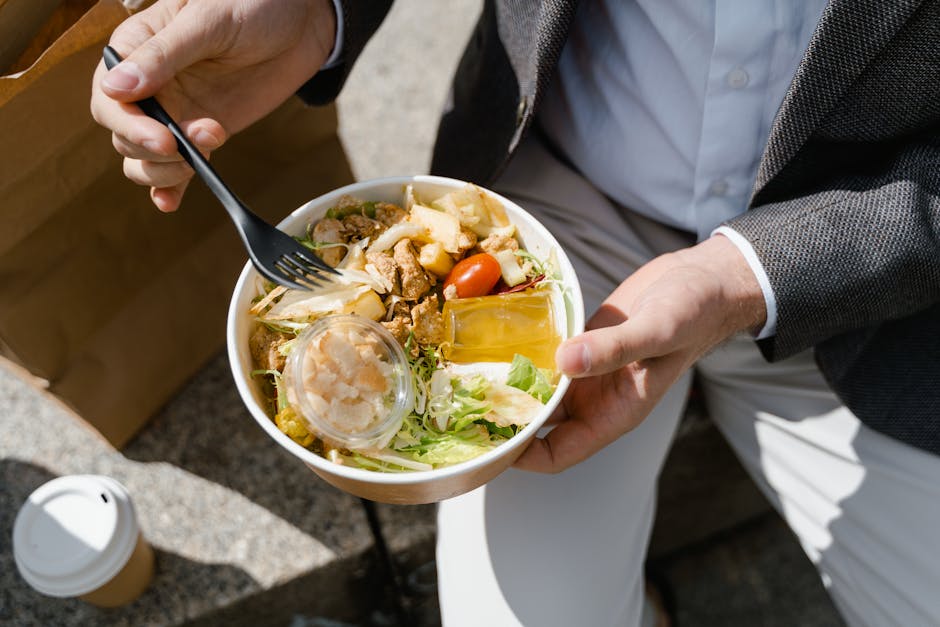 office worker lunch break searching food on phone