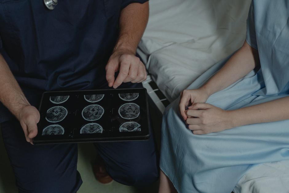 doctor explaining symptom to patient
